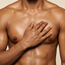 Load image into Gallery viewer, Lighter-skinned adult man with a soft moisturized glow in a close-up editorial photograph
